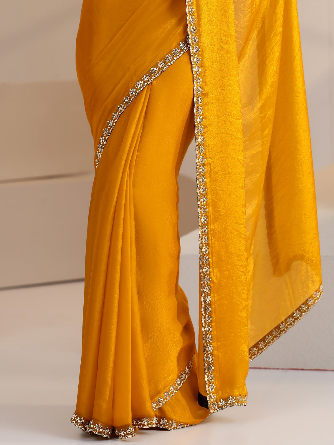 Mameraa Mustard Yellow Tissue Saree with Stone Work Border