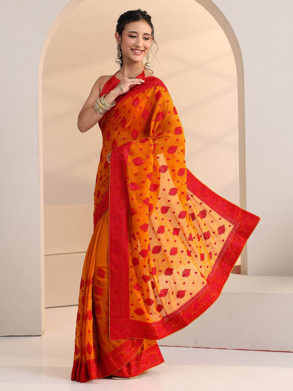 Mameraa Pulp Orange Georgette Saree with Embroidered Border