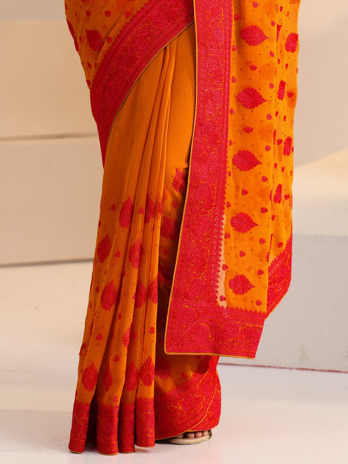 Mameraa Pulp Orange Georgette Saree with Embroidered Border