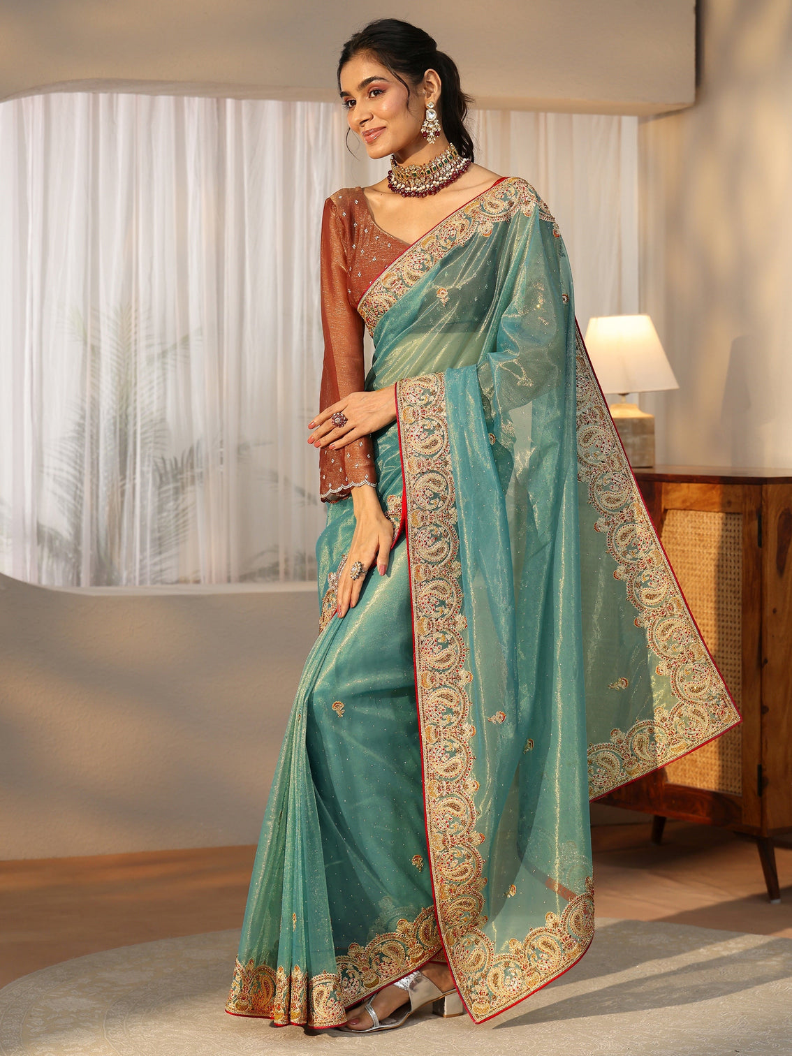 Mameraa Aqua Blue Net Saree with Embellished Paisley Border