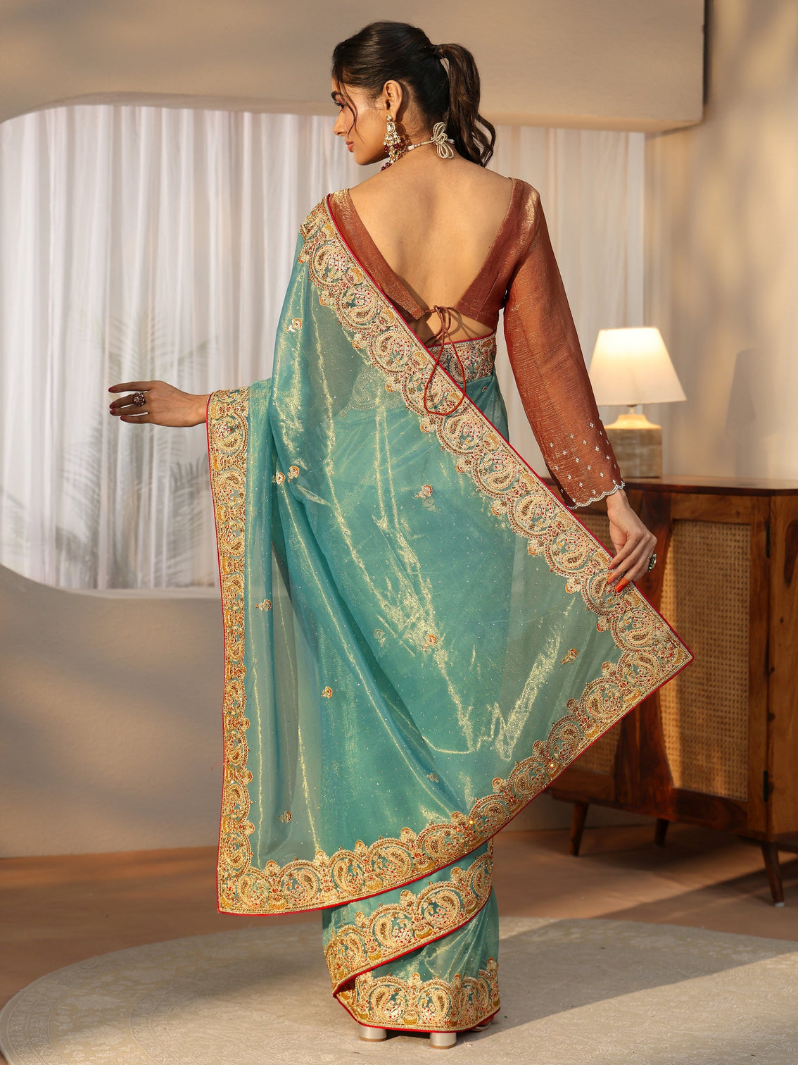 Mameraa Aqua Blue Net Saree with Embellished Paisley Border