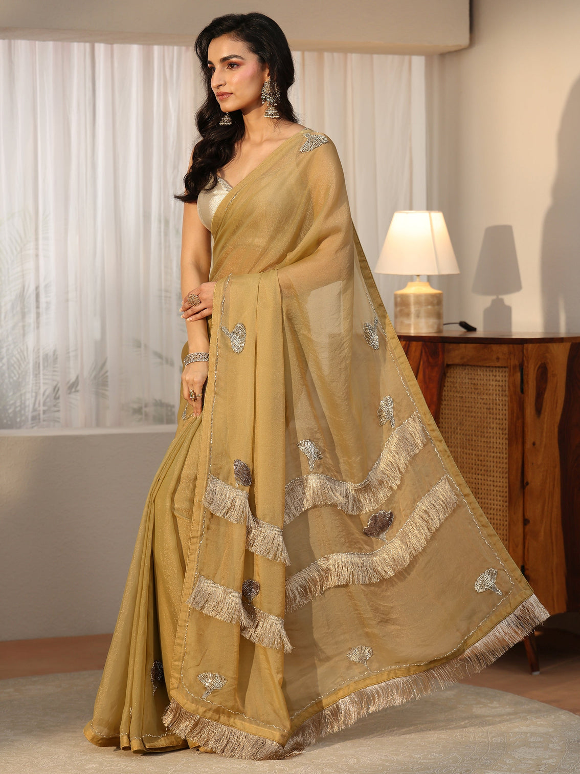 Mameraa Henna Green Tissue Saree with Tassel Embellished Pallu