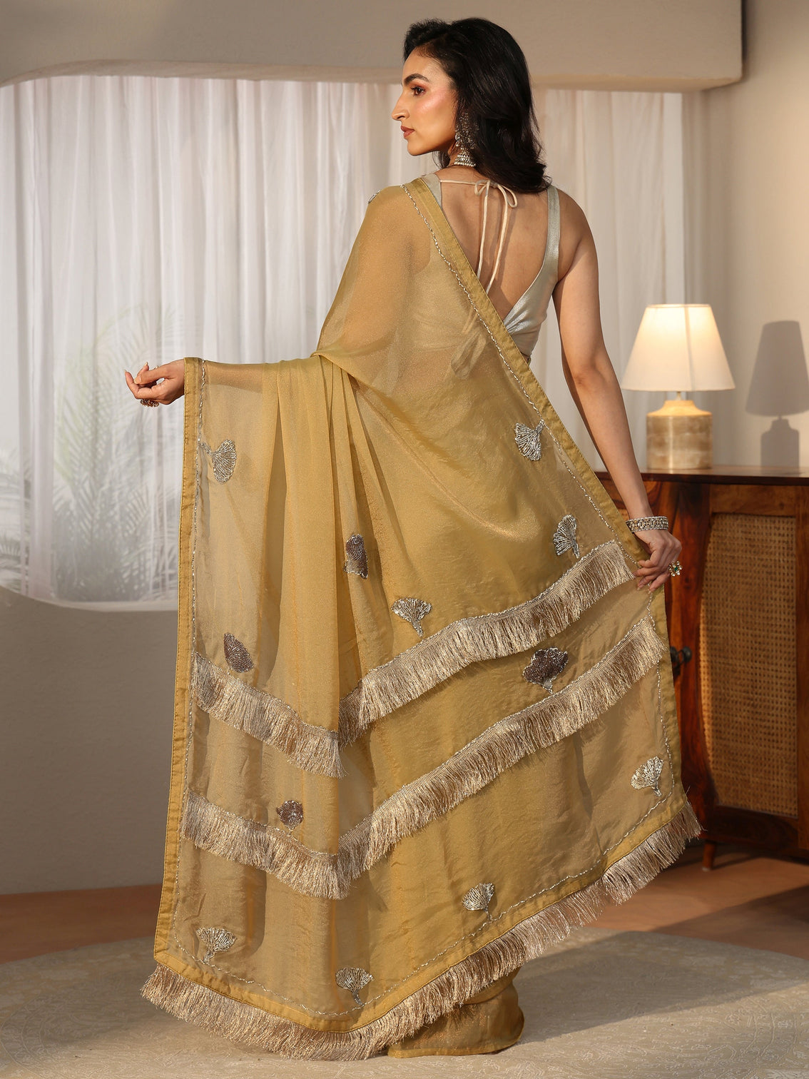 Mameraa Henna Green Tissue Saree with Tassel Embellished Pallu