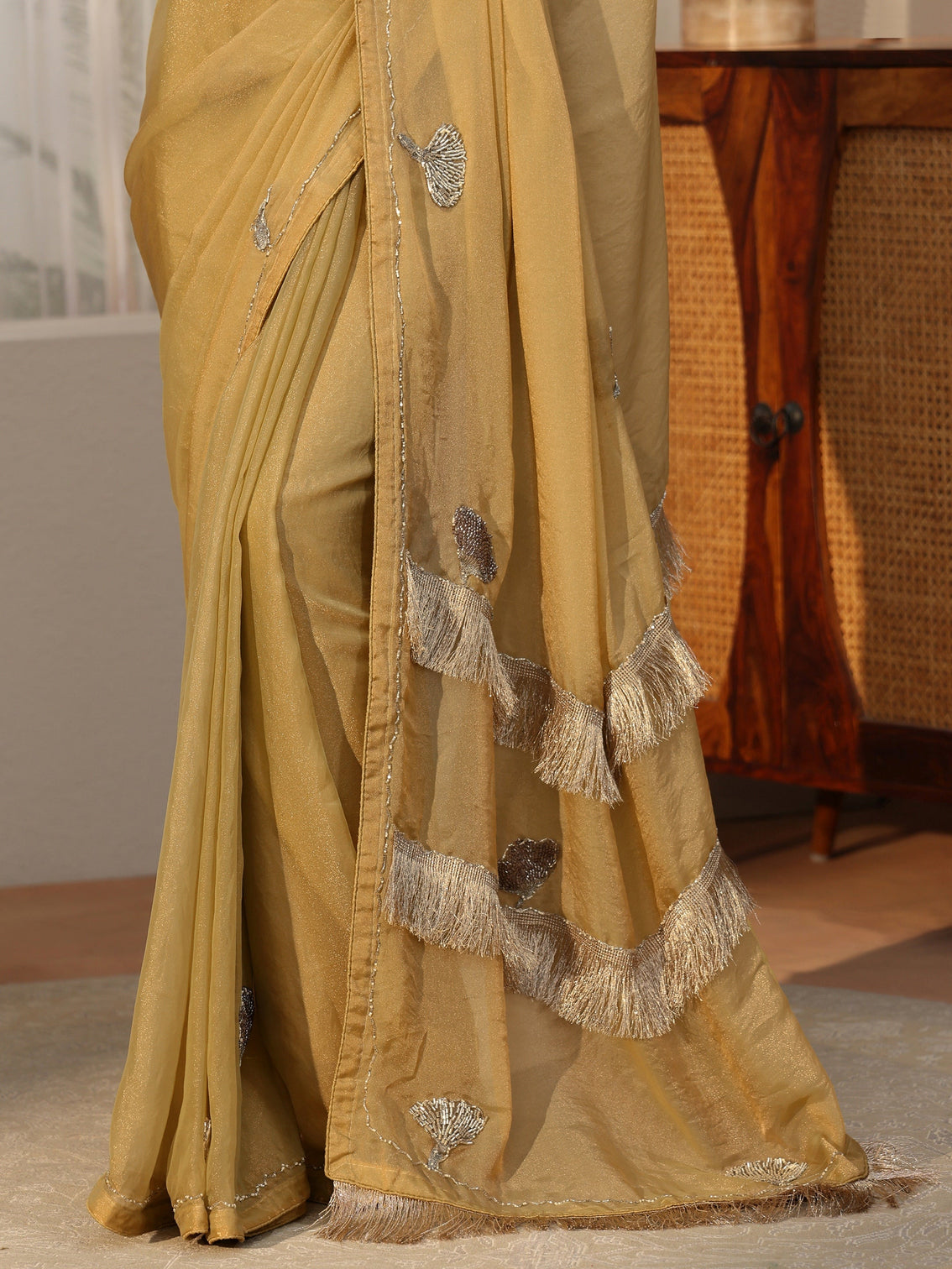 Mameraa Henna Green Tissue Saree with Tassel Embellished Pallu
