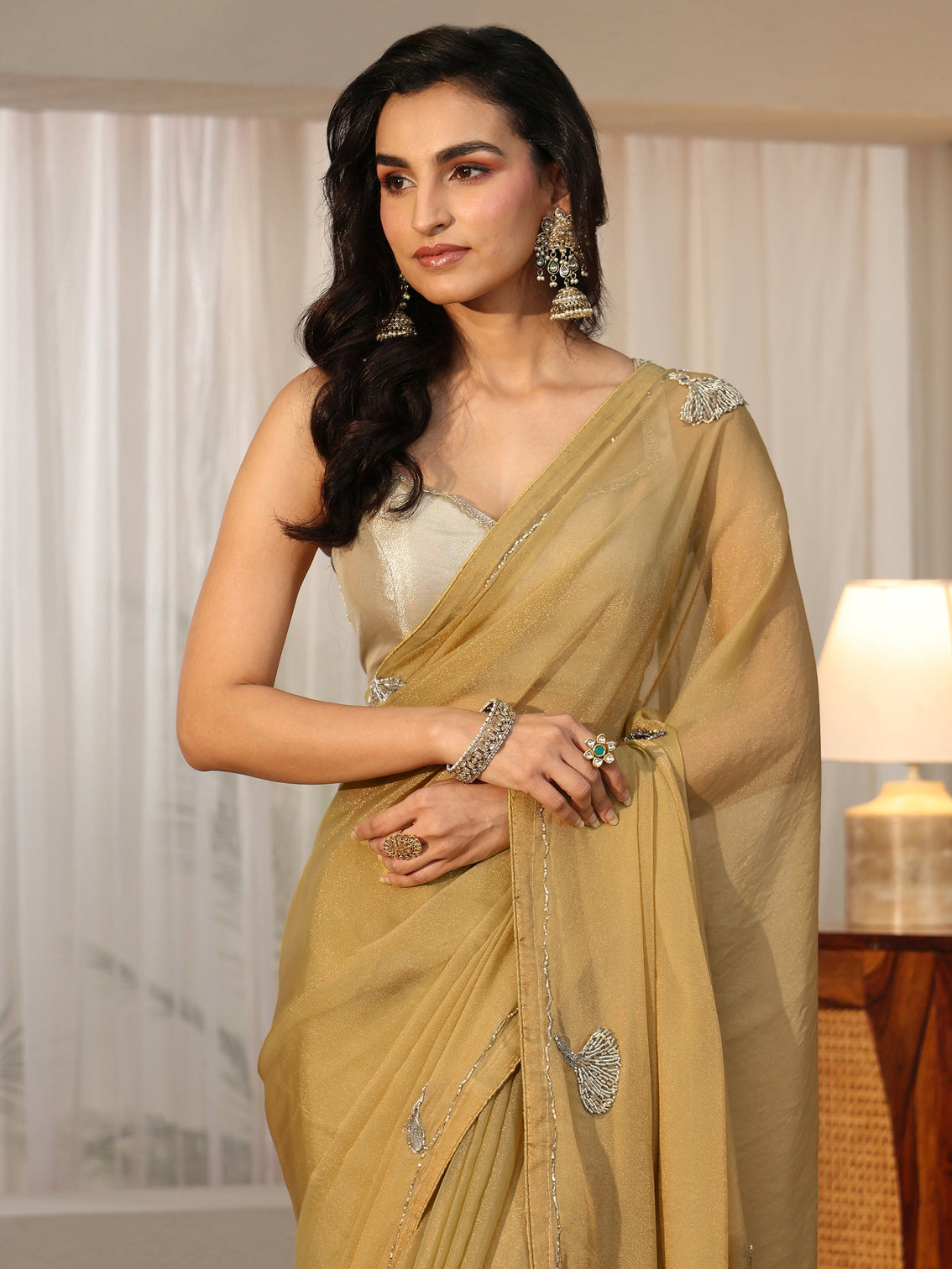 Mameraa Henna Green Tissue Saree with Tassel Embellished Pallu