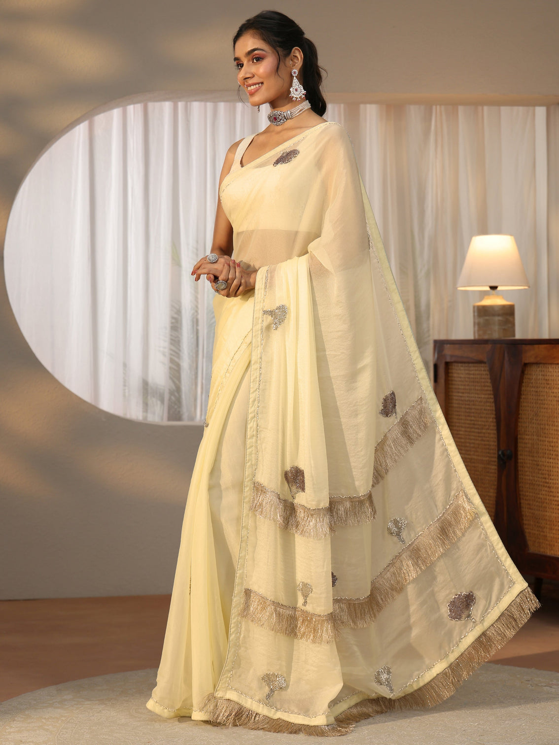 Mameraa Light Yellow Tissue Saree with Tassel Embellished Pallu