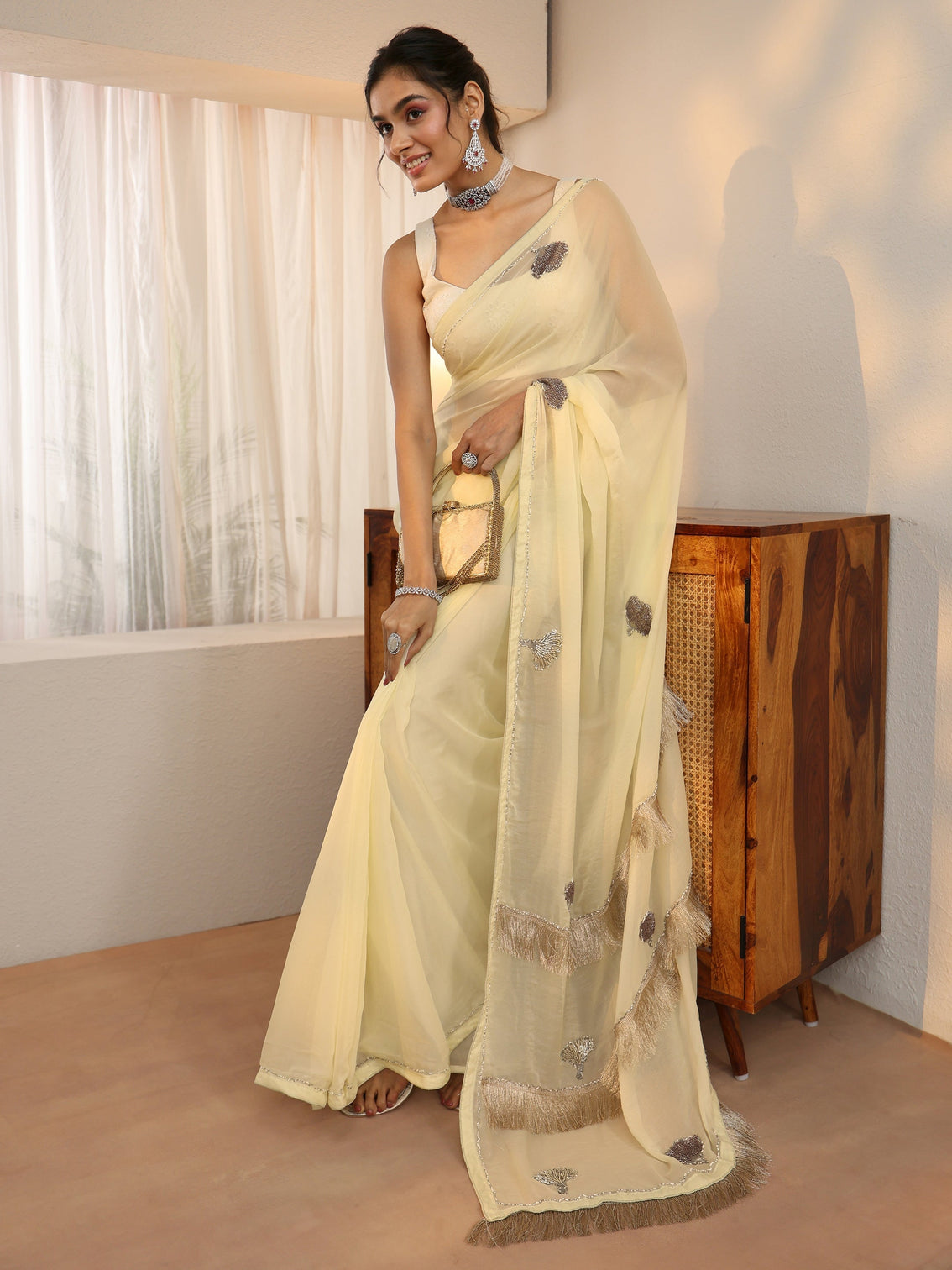 Mameraa Light Yellow Tissue Saree with Tassel Embellished Pallu