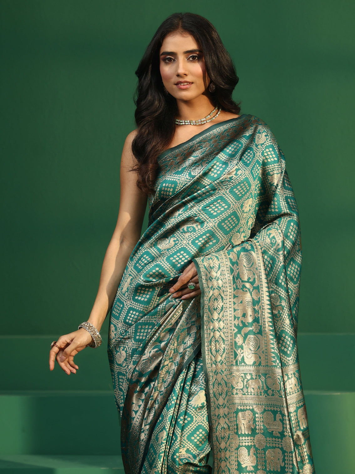 Mameraa Teal Green Brocade Saree with Elephant Motifs