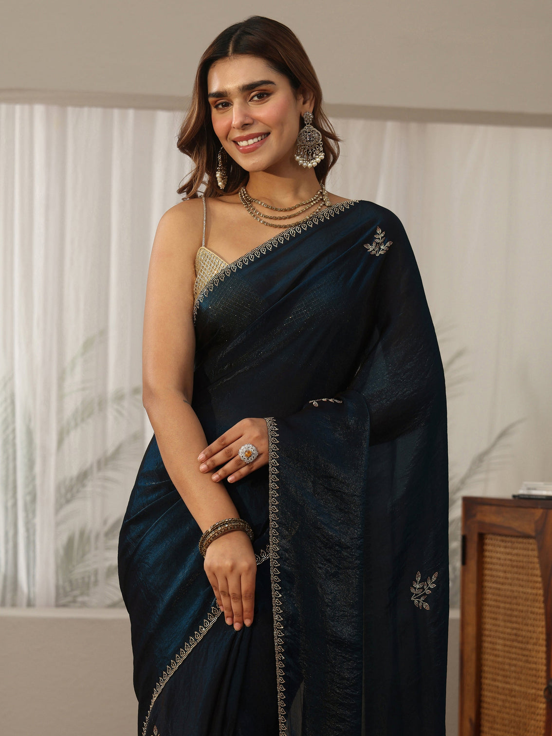 Mameraa Teal Blue Floral Embellished Tissue Saree