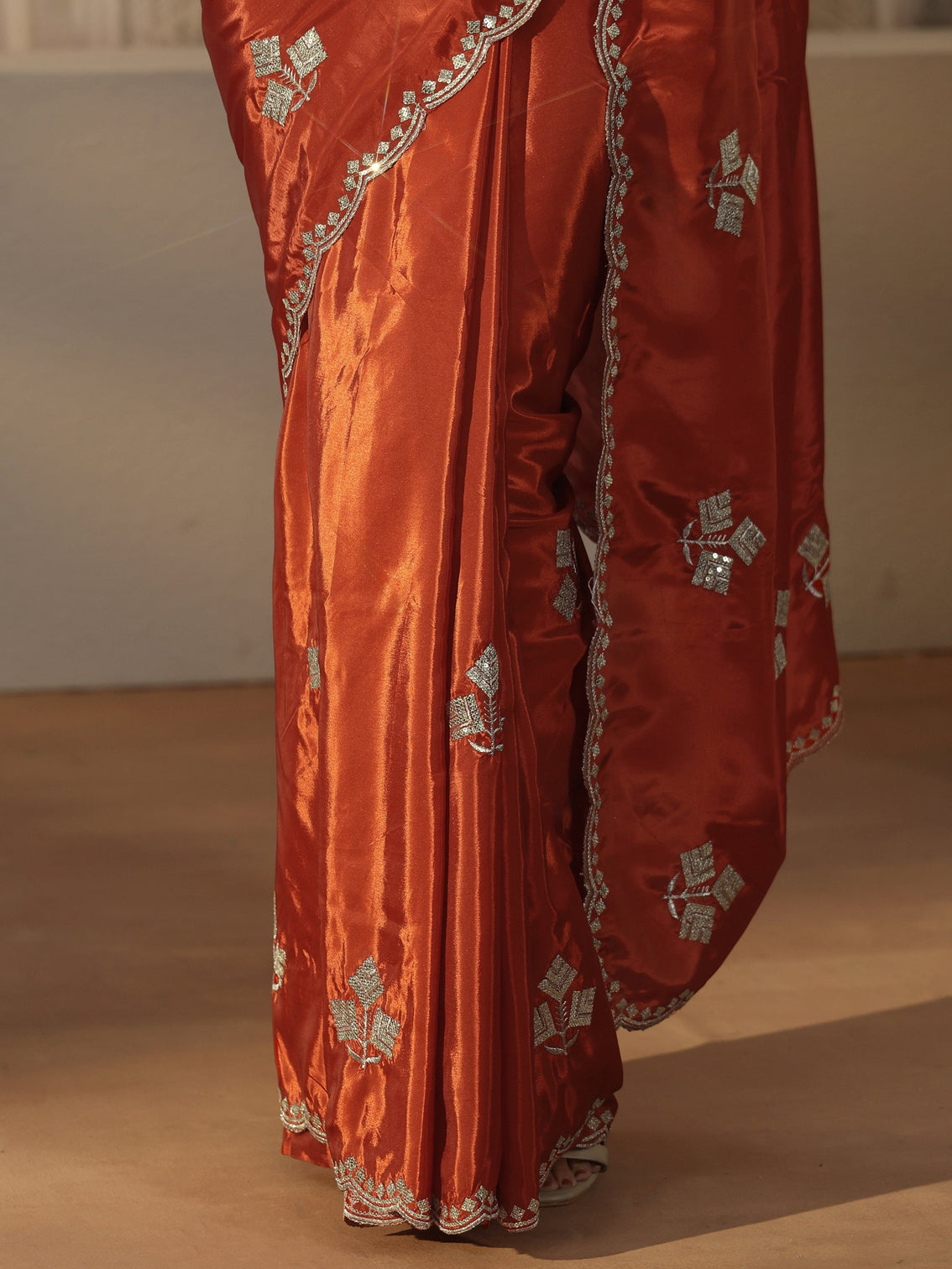 Mameraa Burnt Orange Floral Embellished Satin Saree