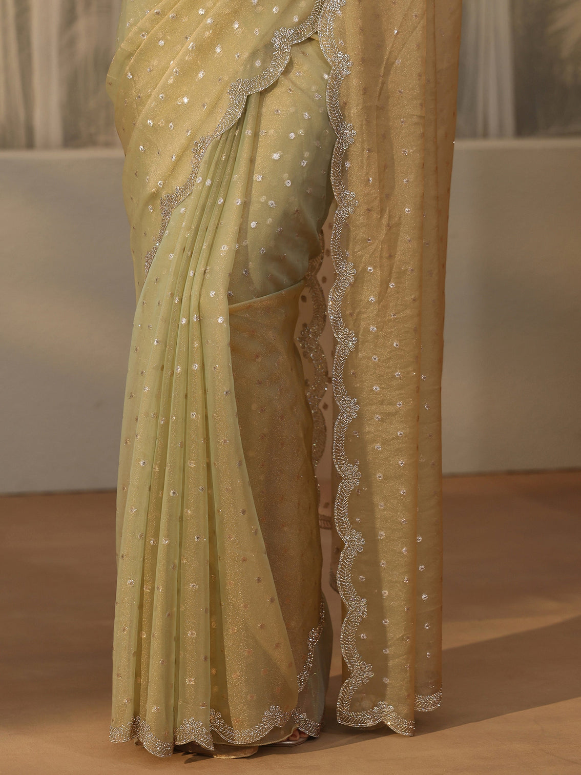 Mameraa Sage Green Embellished Tissue Saree with Scalloped Border