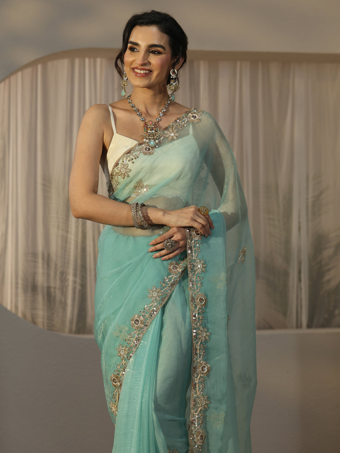 Mameraa Turquoise Blue Floral Embellished Tissue Saree