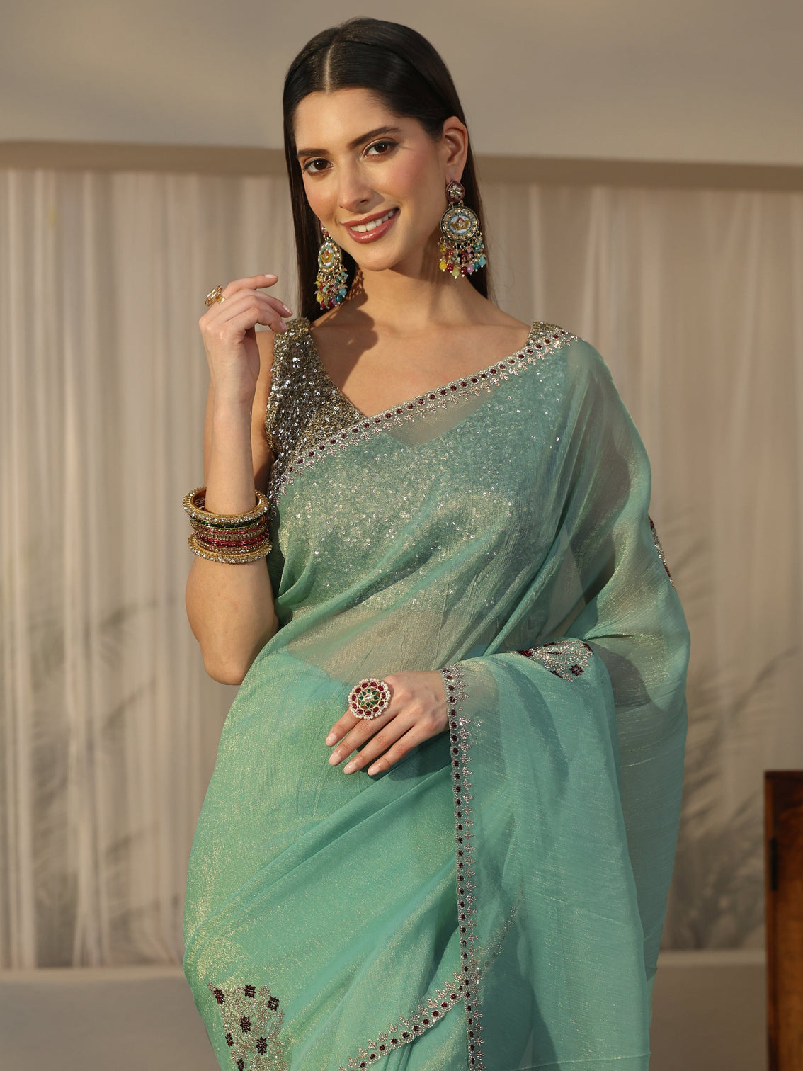 Mameraa Sea Green Floral Embellished Tissue Saree