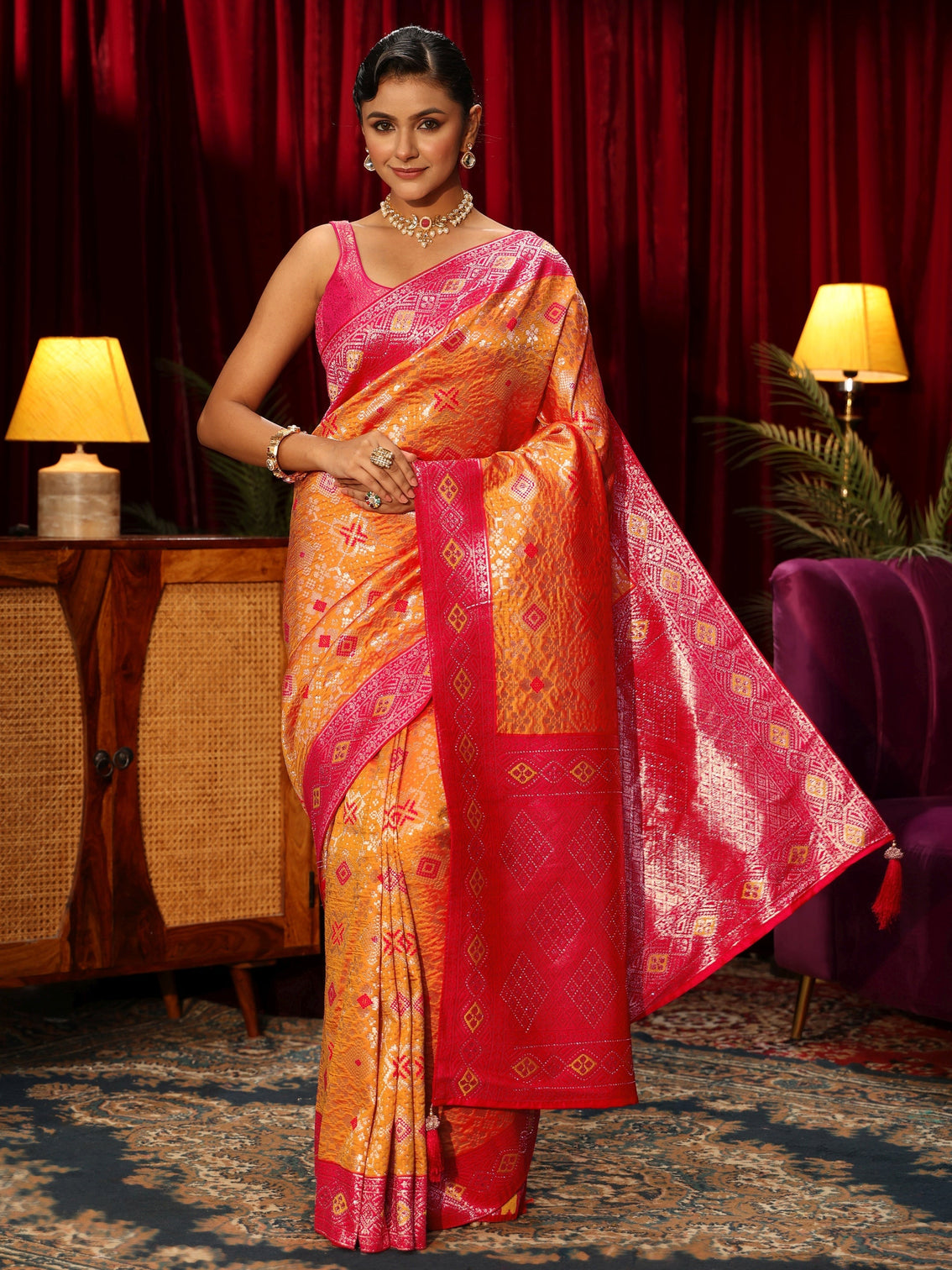Mameraa Orange Woven Design Embellished Silk Blend Patola Saree