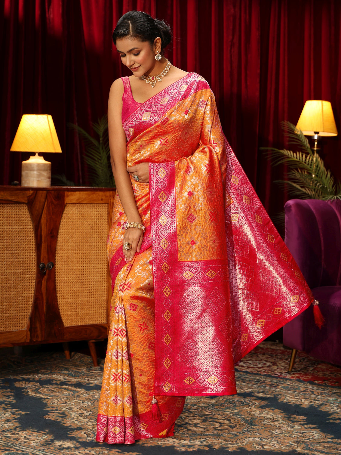 Mameraa Orange Woven Design Embellished Silk Blend Patola Saree
