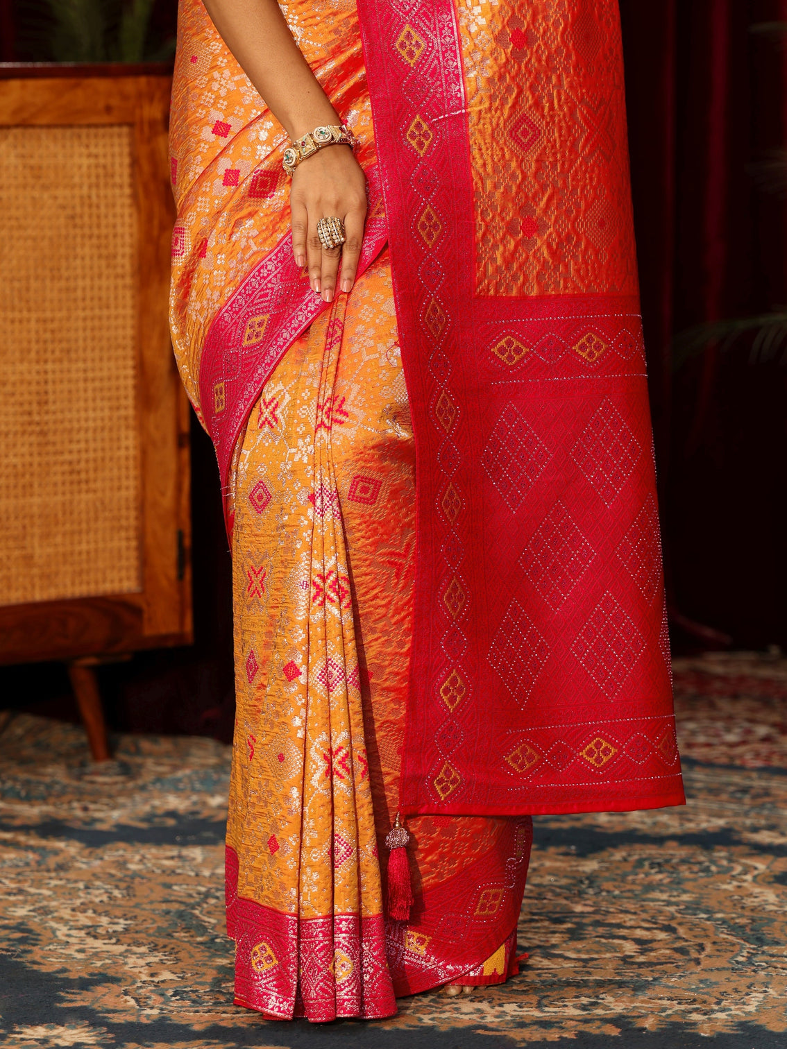 Mameraa Orange Woven Design Embellished Silk Blend Patola Saree
