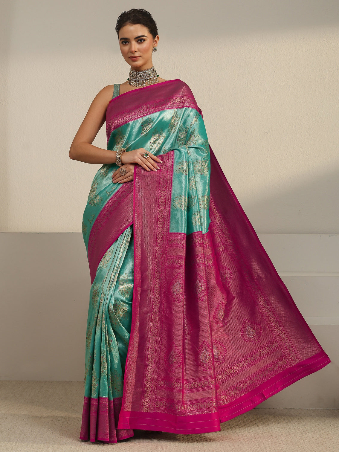 Mameraa Turquoise and Pink Floral Woven Design Silk Blend Saree