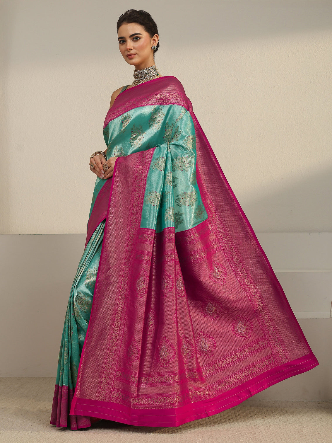 Mameraa Turquoise and Pink Floral Woven Design Silk Blend Saree