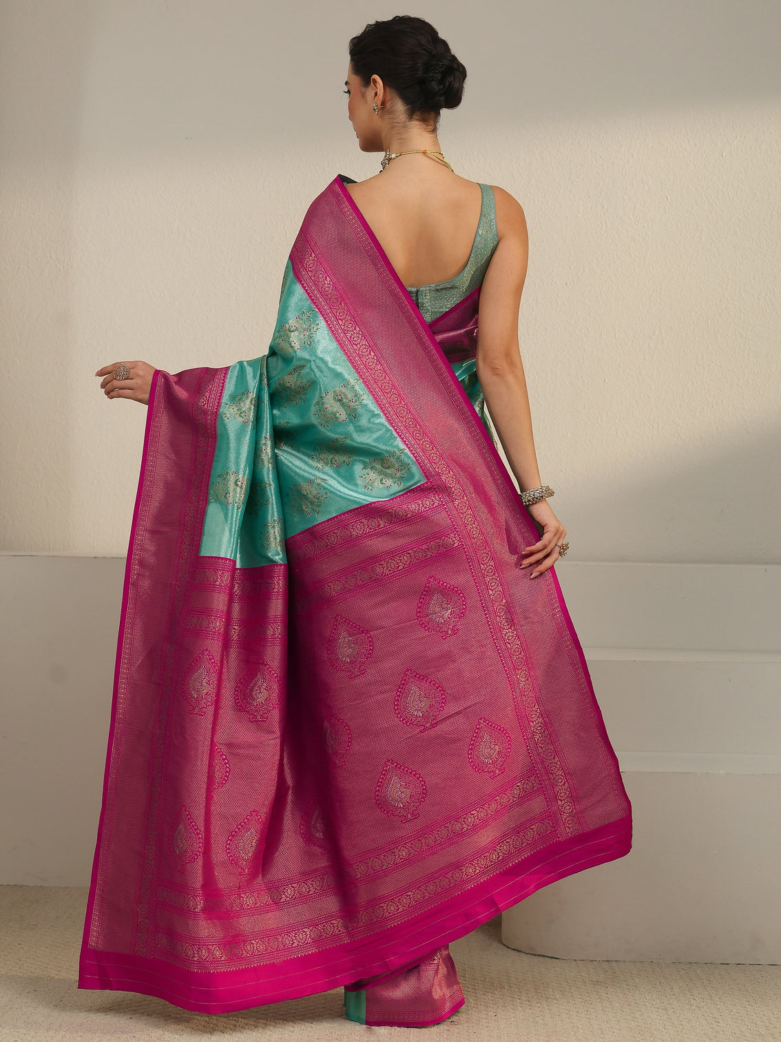 Mameraa Turquoise and Pink Floral Woven Design Silk Blend Saree