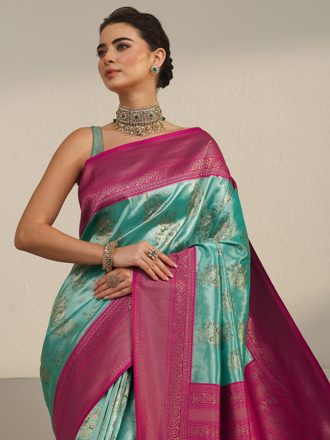 Mameraa Turquoise and Pink Floral Woven Design Silk Blend Saree