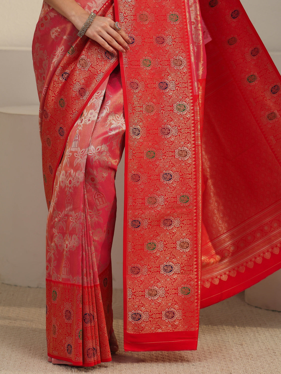 Mameraa Peach Pink and Red Floral Woven Design Silk Blend Saree