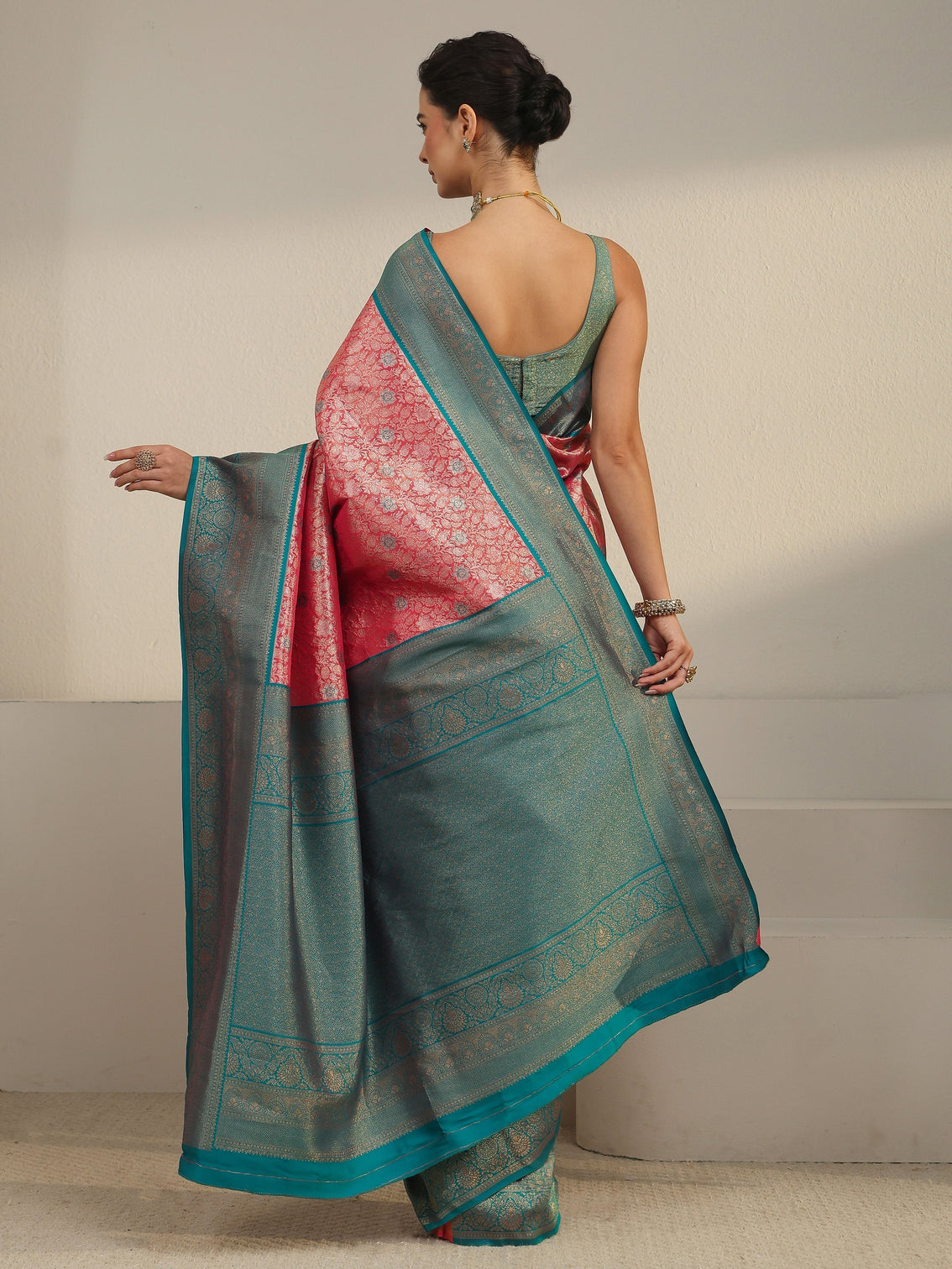 Mameraa Peach Pink and Blue Floral Woven Design Silk Blend Saree