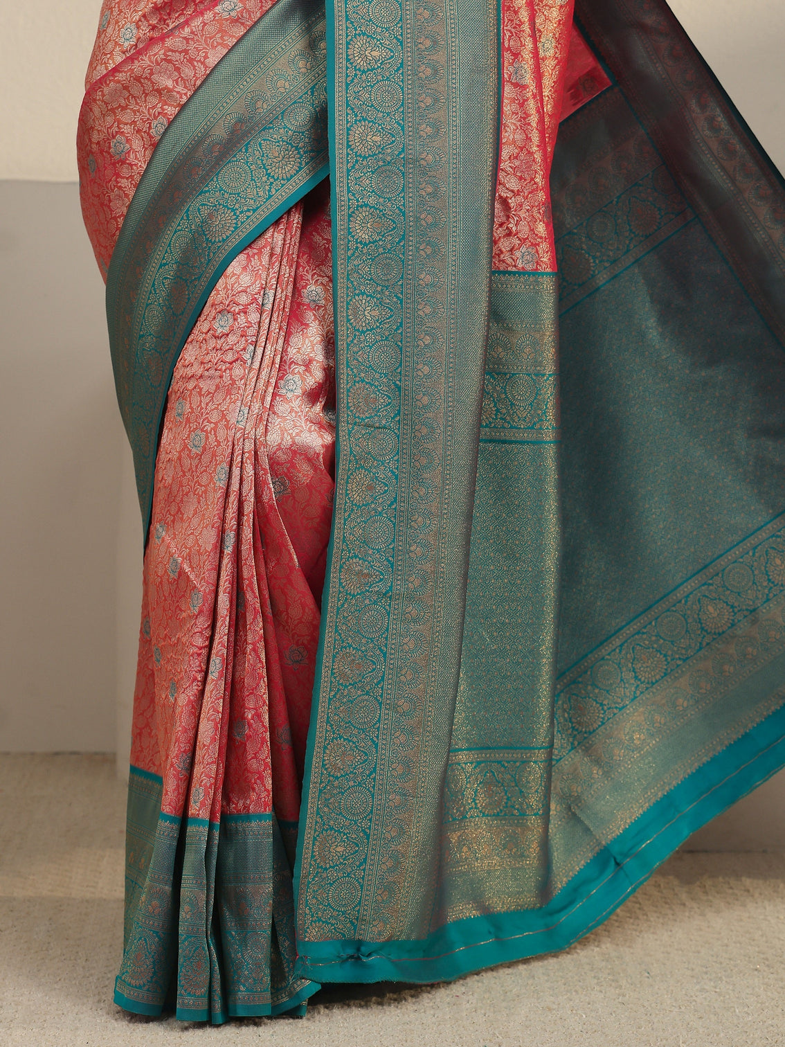 Mameraa Peach Pink and Blue Floral Woven Design Silk Blend Saree