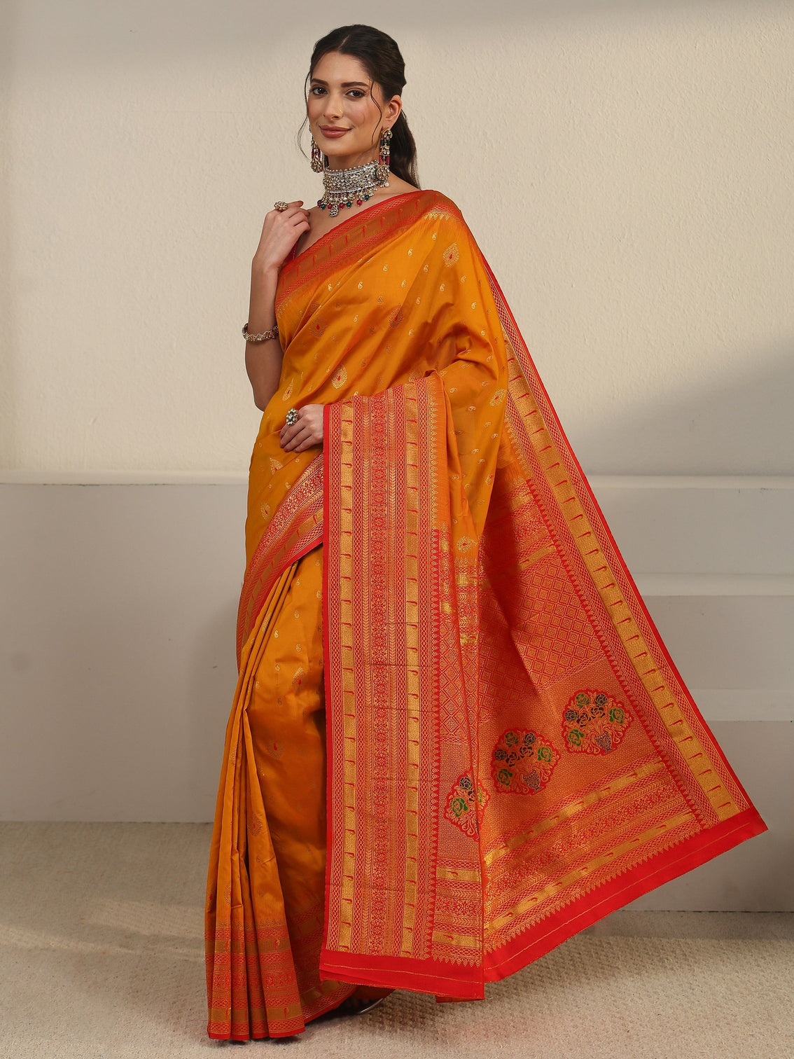 Mameraa Orange Woven Design Silk Blend Saree