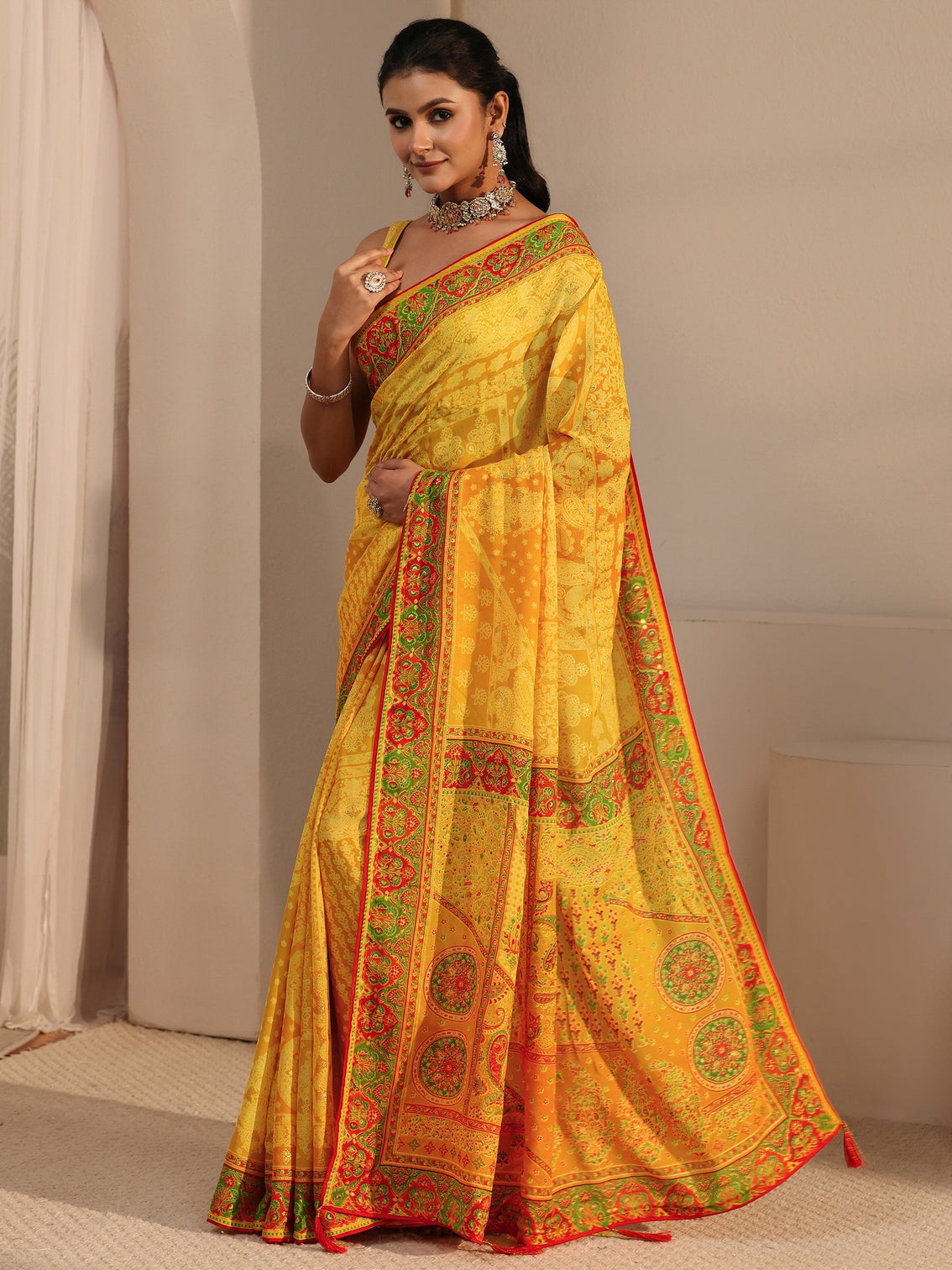 Mameraa Yellow Printed Georgette Saree