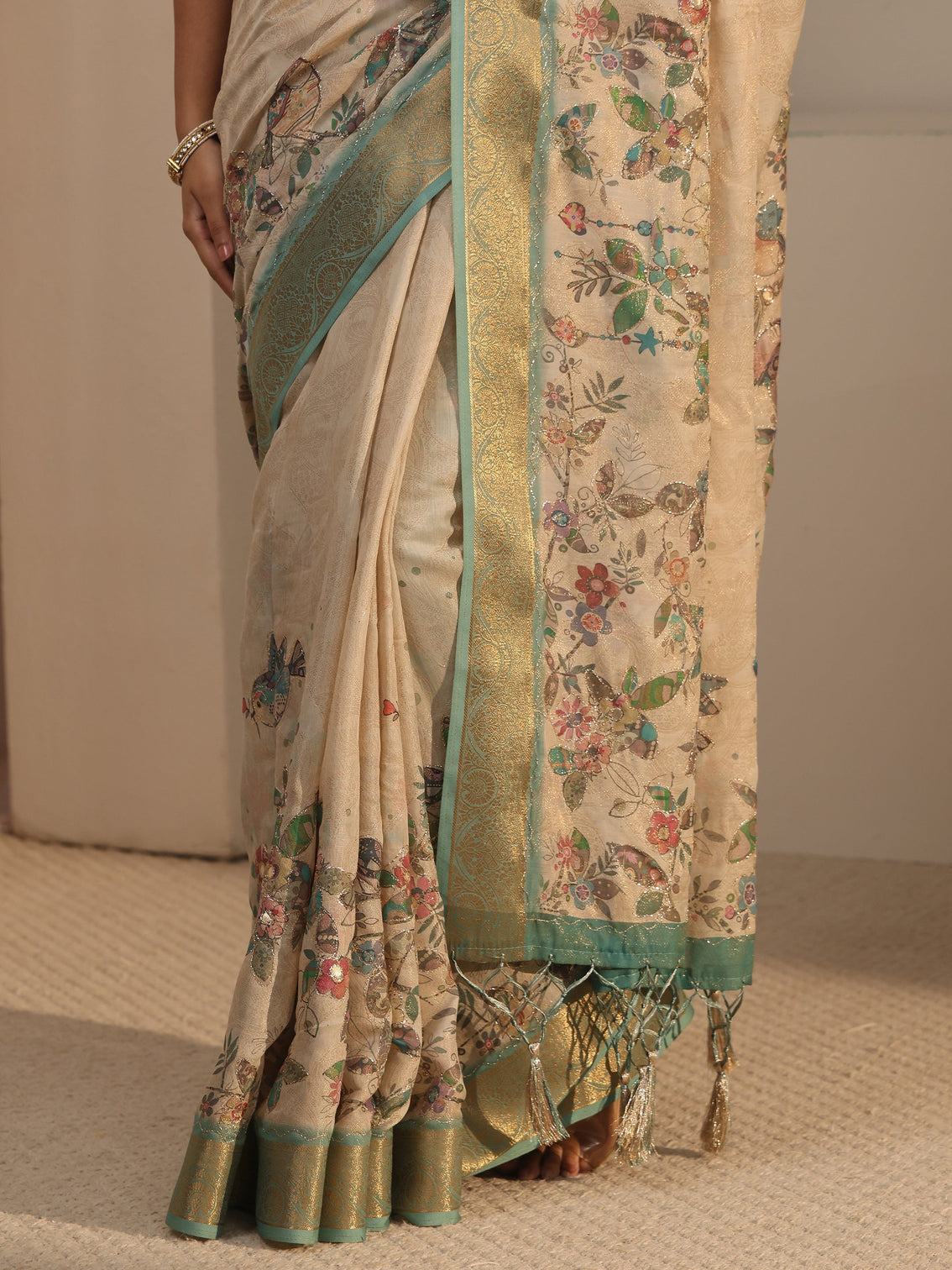 Mameraa Beige Floral Printed Silk Blend Tassel Saree with Woven Border