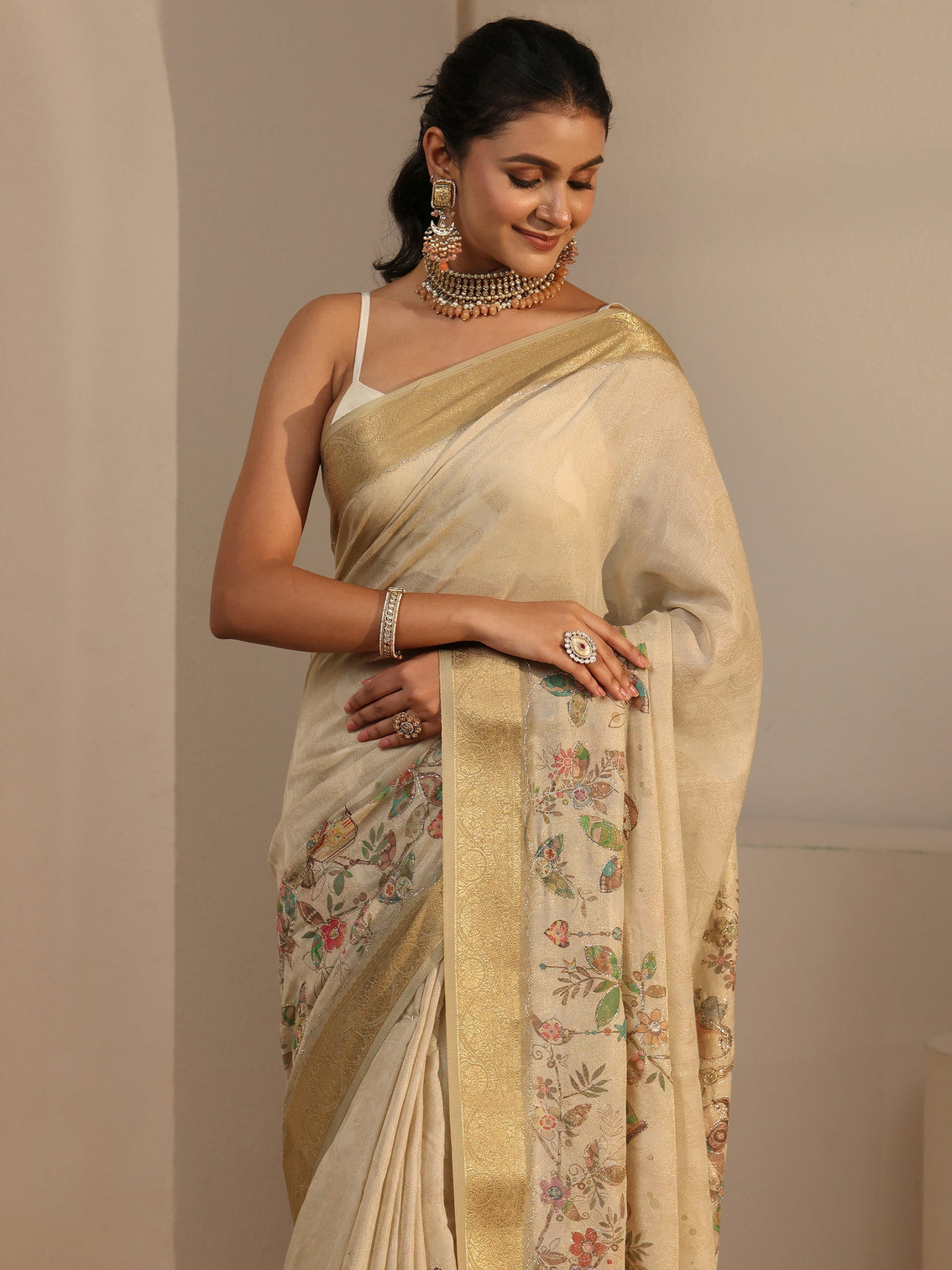 Mameraa Beige Floral Printed Silk Blend Tassel Saree with Woven Border