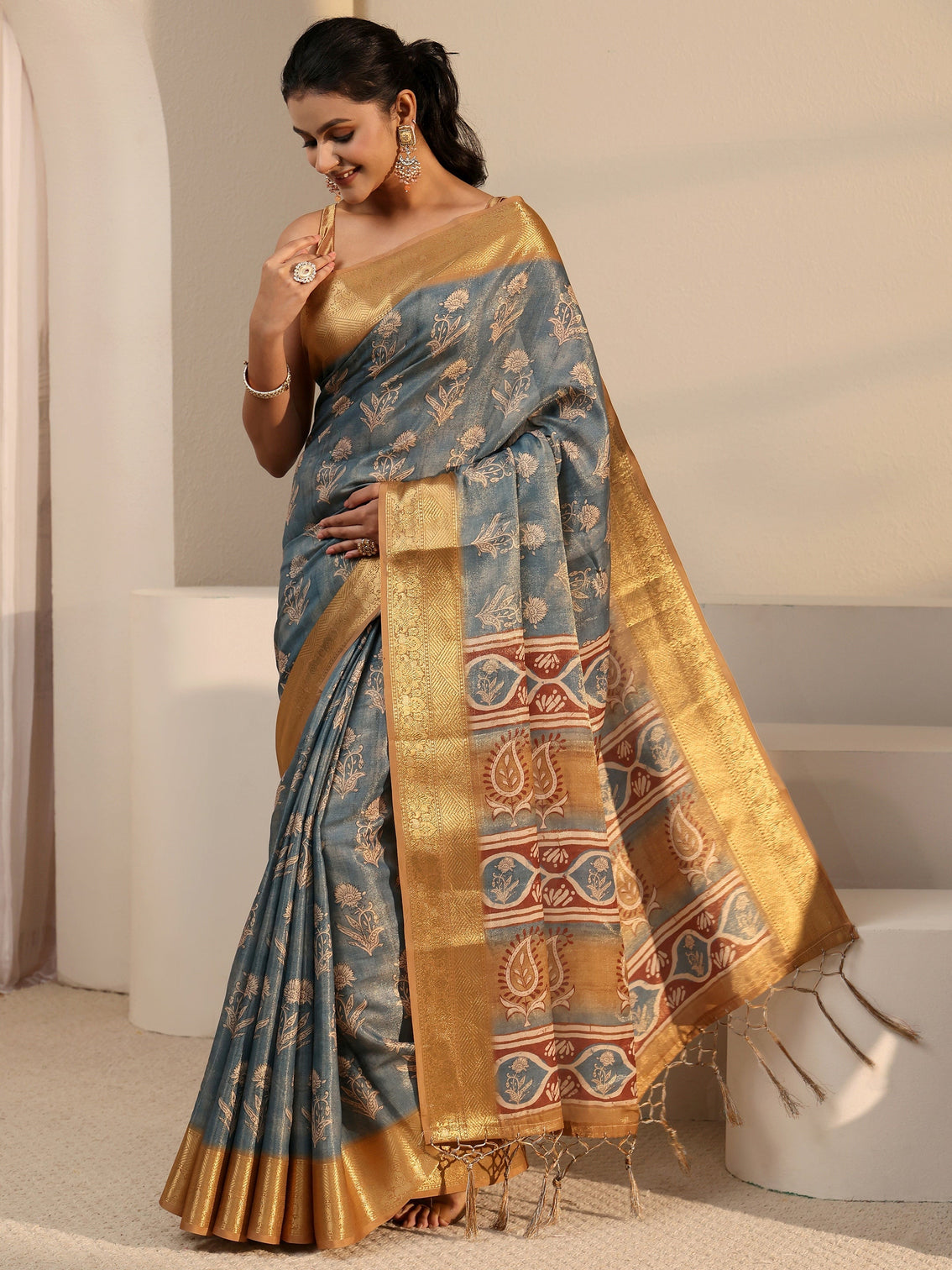Mameraa Blue Floral Printed Silk Blend Tassel Saree with Woven Border