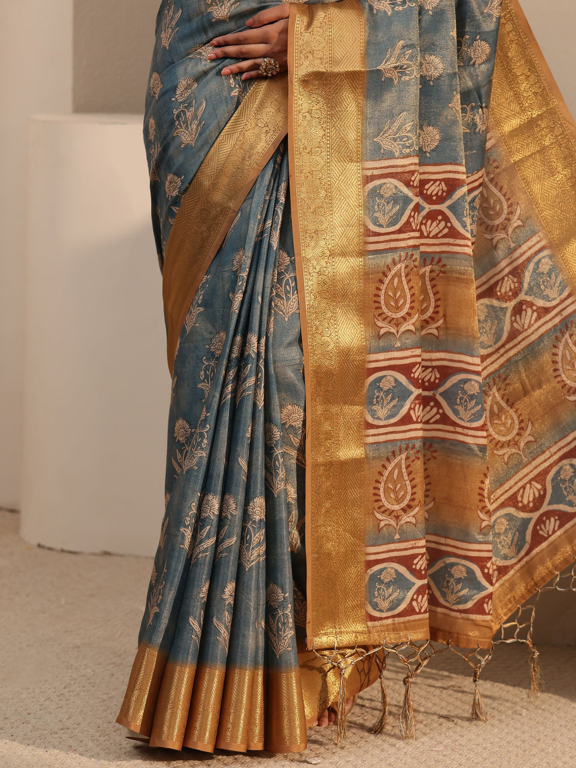 Mameraa Blue Floral Printed Silk Blend Tassel Saree with Woven Border