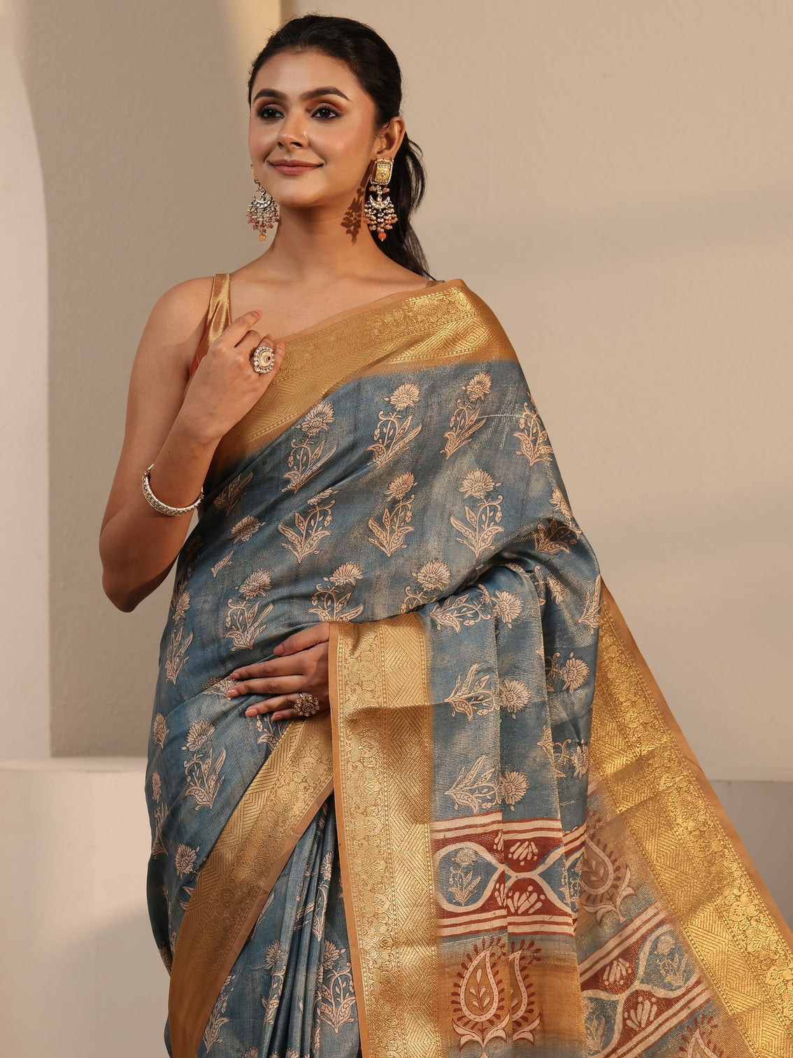 Mameraa Blue Floral Printed Silk Blend Tassel Saree with Woven Border