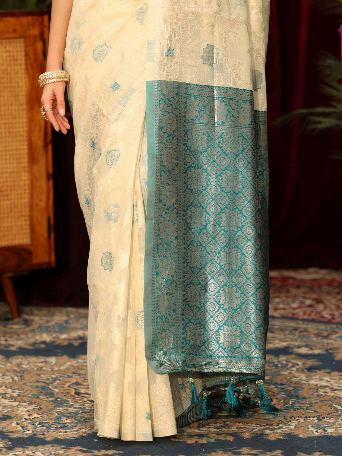 Mameraa Cream Floral Woven Design Silk Blend Tassel Saree