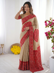 Beige crimson red bandhani inspired modal silk saree with traditional folk print pallu stone embellishments mameraa