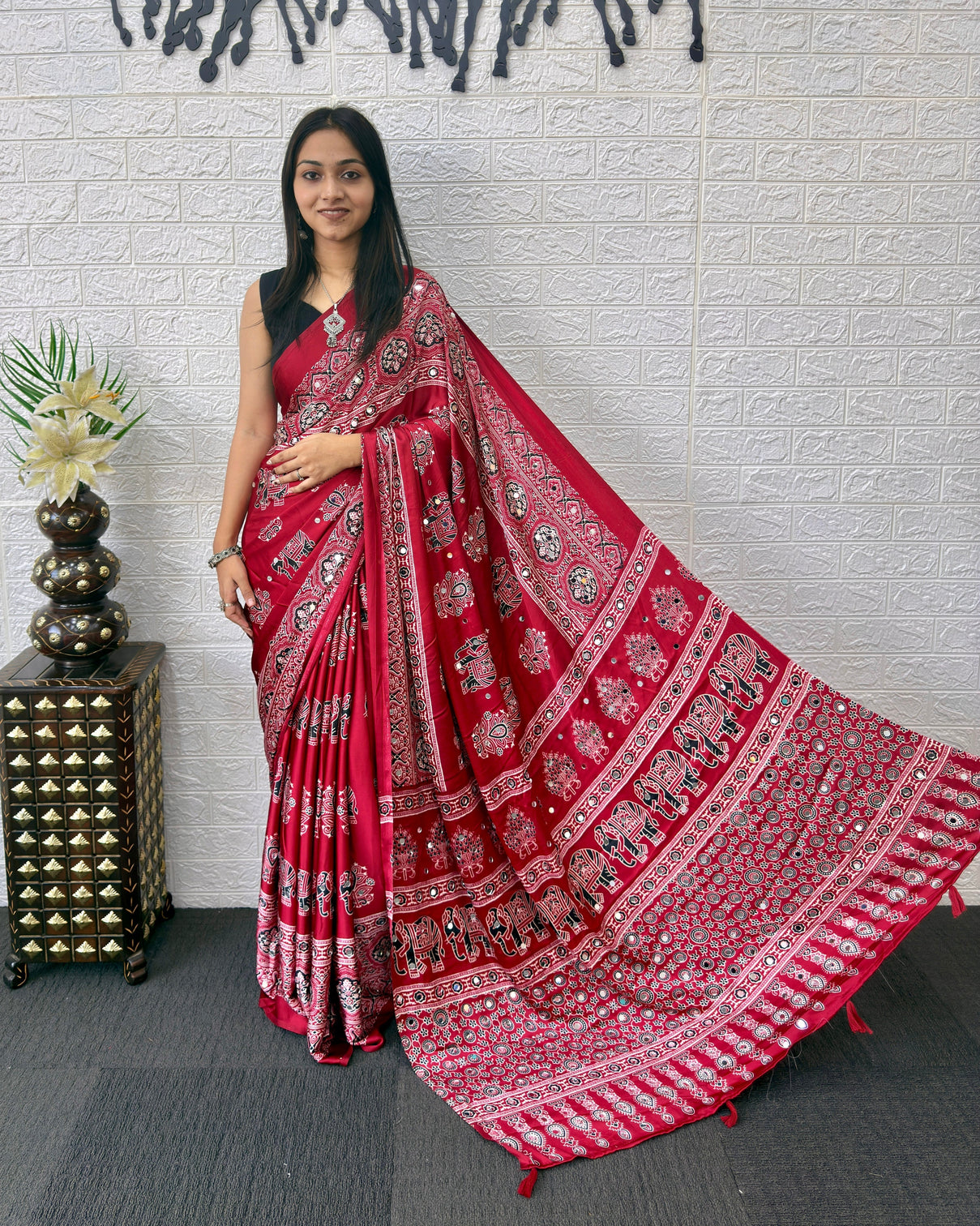 Maroon modal silk ajrakh print saree with traditional elephant motifs designer pallu tassels festive ethnic wear saree mameraa