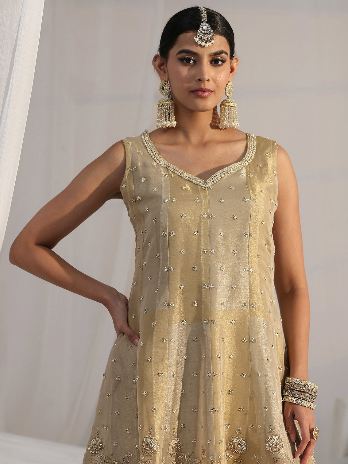 Mameraa Art Golden Floral Embellished Sleeveless Tissue Sharara Suit Set