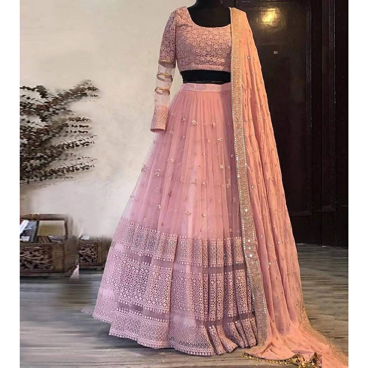 Peach Lehenga Choli in Net with Heavy Thread Embroidery Work