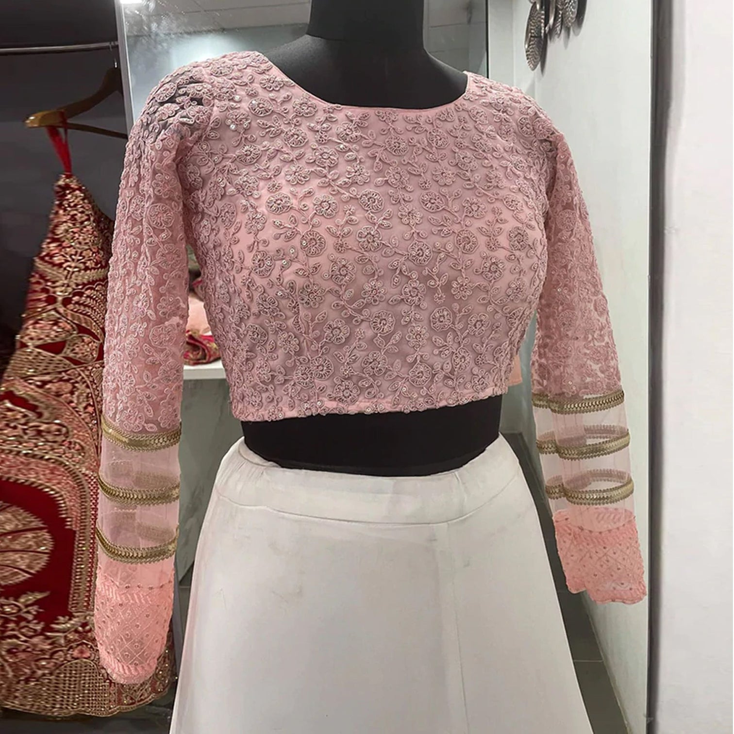 Peach Lehenga Choli in Net with Heavy Thread Embroidery Work