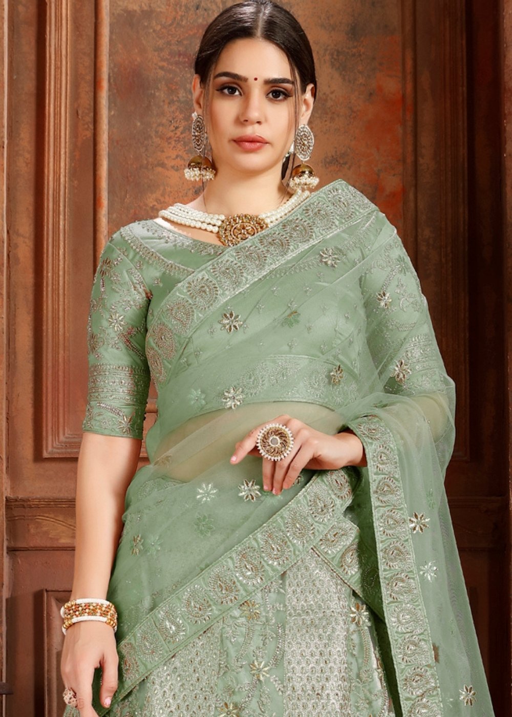 Pista Green Soft Net Lehenga Choli with Thread, Zari, Zarkan & Pearl work