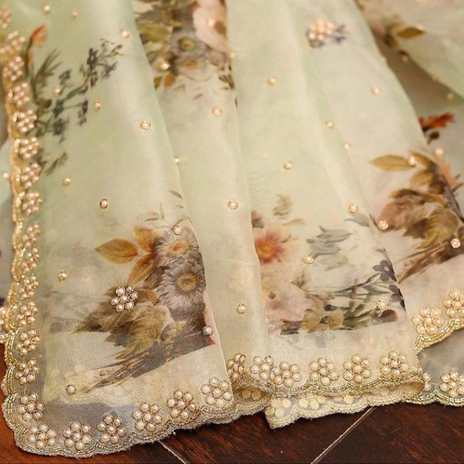 Pure Organza Saree with Beautiful Hand Print Zardosi touch up of Pearl and Matching Silk Blouse
