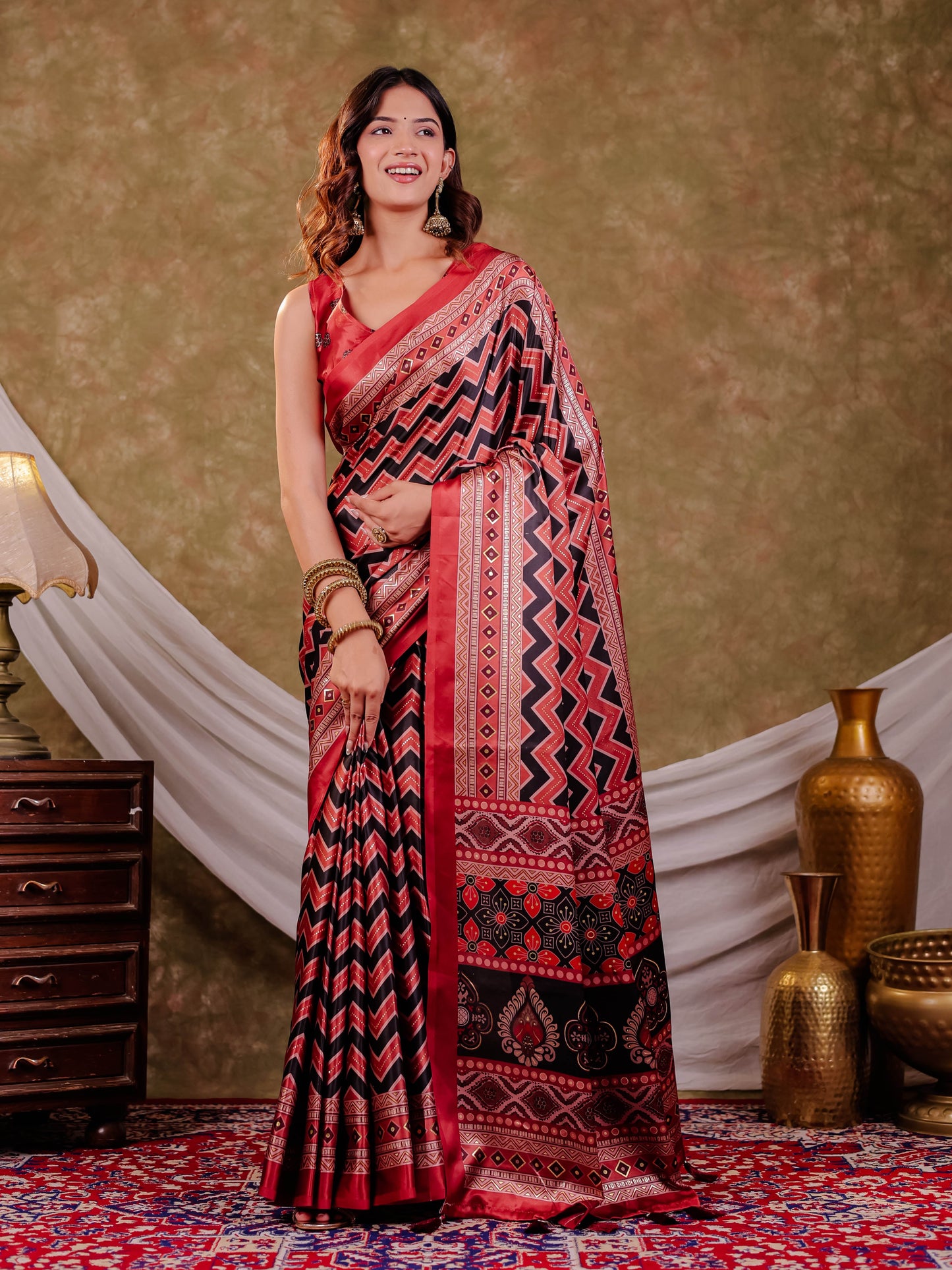 Brick Red Pure Chinnon Ajrakh Printed Saree with Tassel Edges, Chevron Zigzag Print, Designer Border & Matching Blouse Piece
