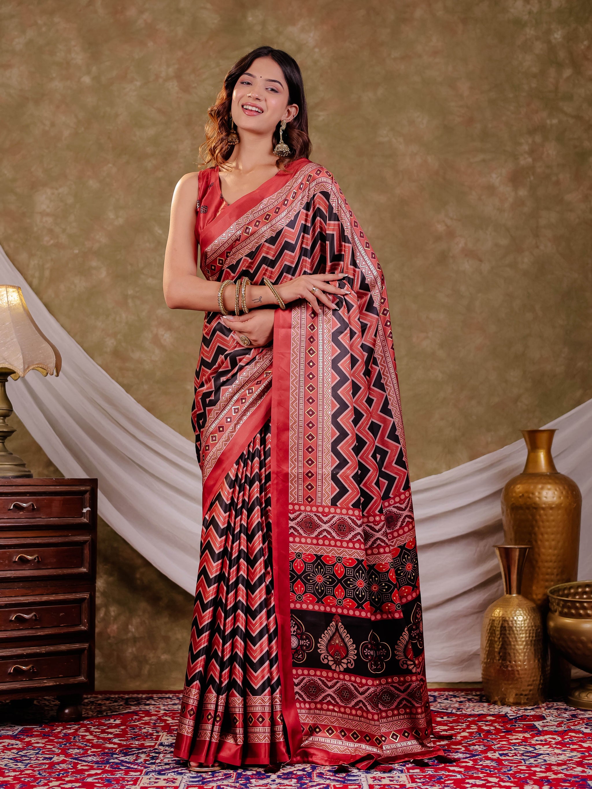 Brick Red Pure Chinnon Ajrakh Printed Saree with Tassel Edges, Chevron Zigzag Print, Designer Border & Matching Blouse Piece