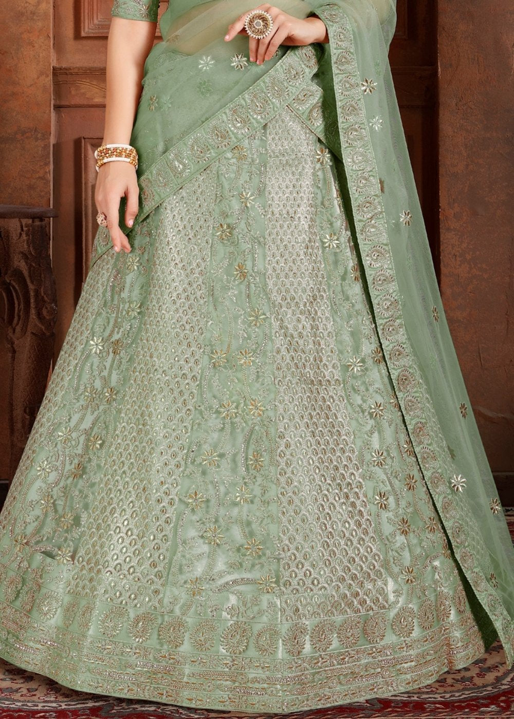 Pista Green Soft Net Lehenga Choli with Thread, Zari, Zarkan & Pearl work