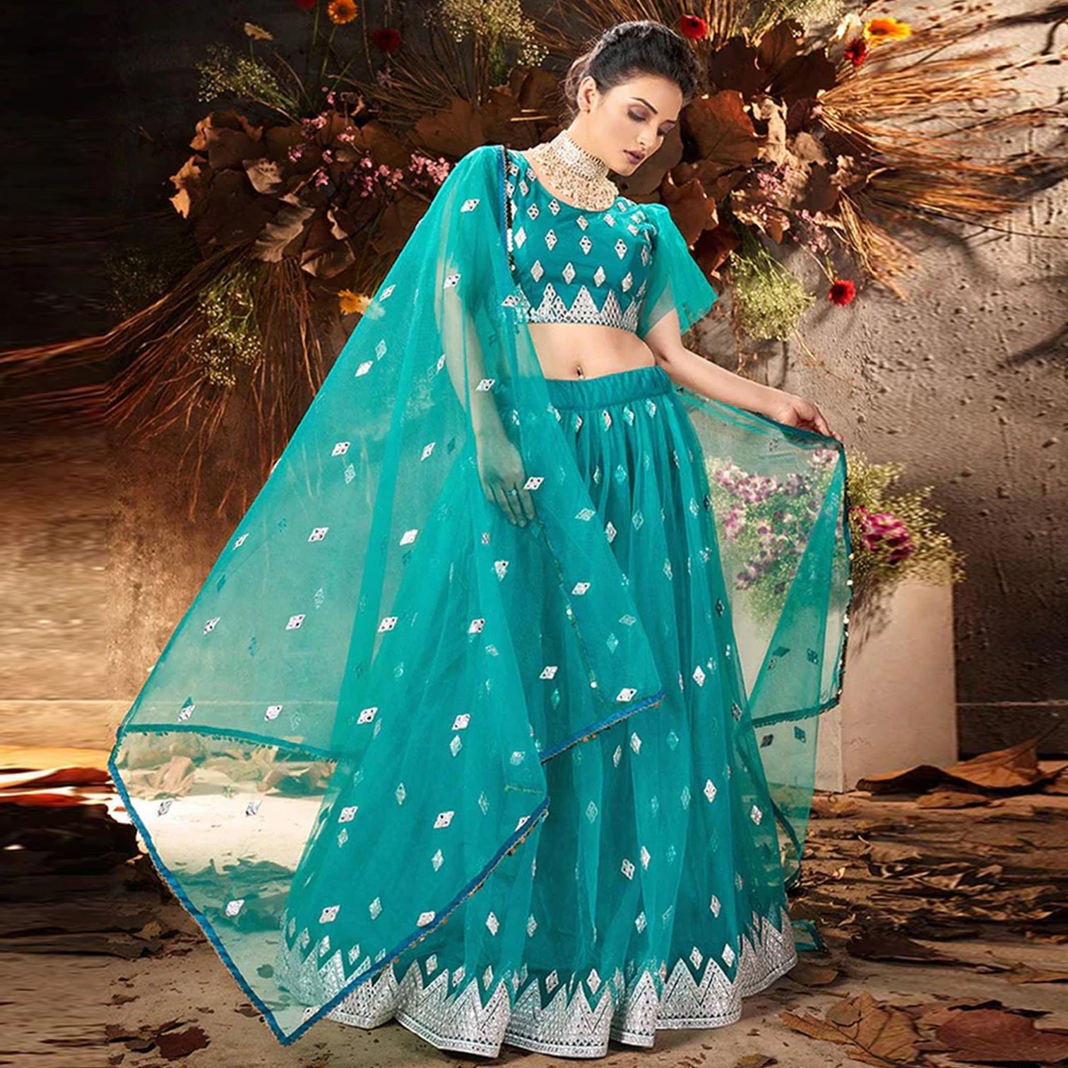Sea Green Lehenga Choli in Soft Net with Embroidery