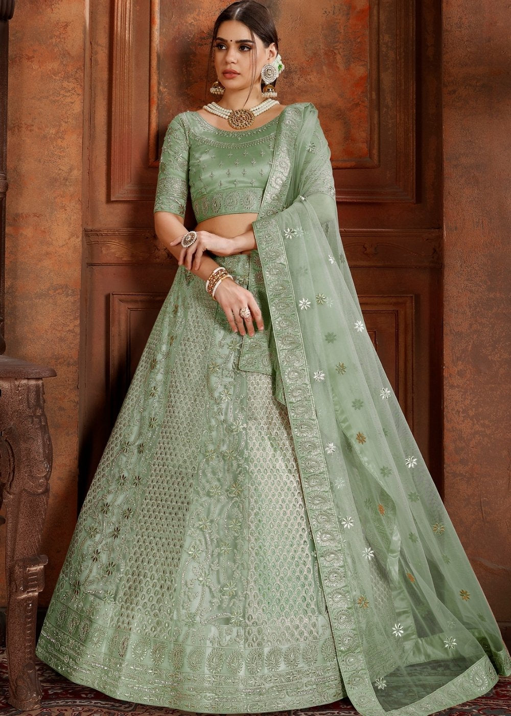 Pista Green Soft Net Lehenga Choli with Thread, Zari, Zarkan & Pearl work