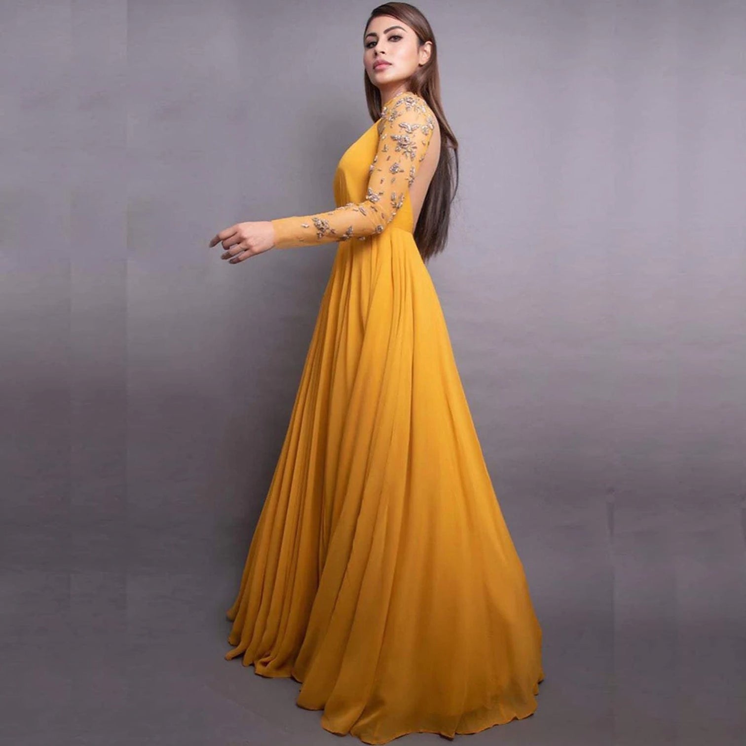 Stunning Mustard colored 8 Meter Flared Maxi Gown with Embellished Sleeves.