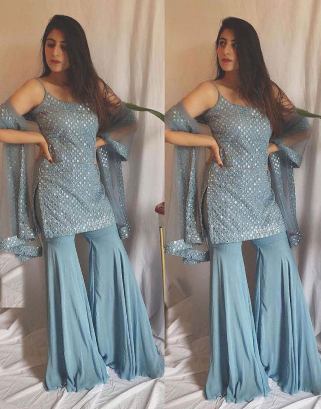 Grey colored Palazzo suit with heavy embroidery work