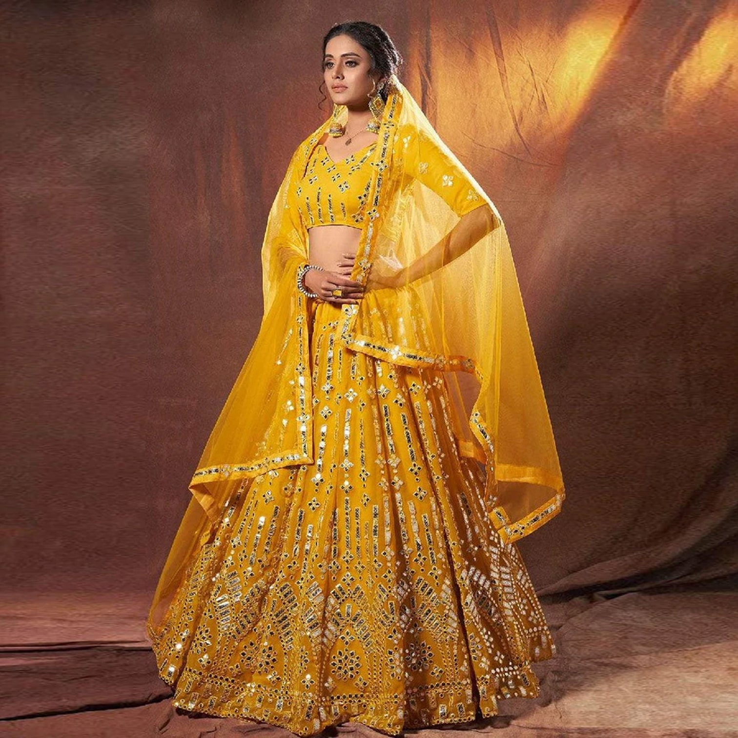 Yellow Georgette Lehenga Choli with Resham And Mirror Work